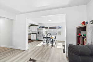 Dining area featuring light hardwood / wood-style flooring