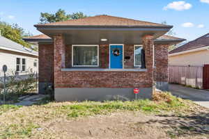 Bungalow featuring a porch