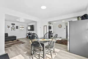 Dining room featuring light wood-type flooring