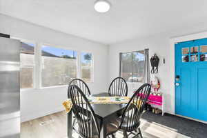 Dining space featuring light wood-type flooring