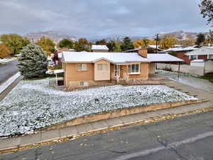 Single story home with a mountain view