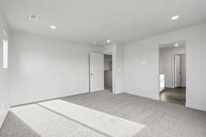 Unfurnished bedroom featuring carpet flooring