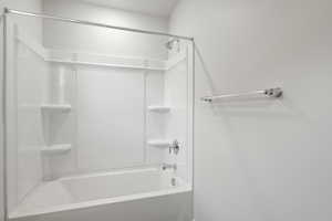 Bathroom with shower / bathtub combination