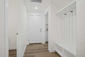 Mudroom featuring light hardwood / wood-style floors