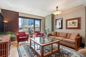 Living room with wood-type flooring