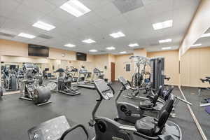 Gym featuring a paneled ceiling