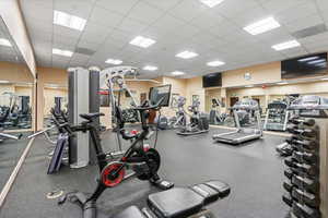 Gym featuring a paneled ceiling