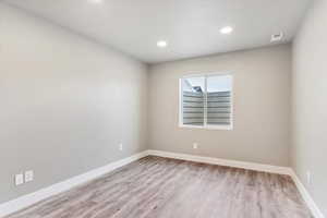 Bedroom featuring light hardwood / wood-style floors