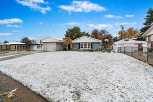 View of front of home with a garage