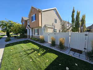 View of home's exterior with a lawn