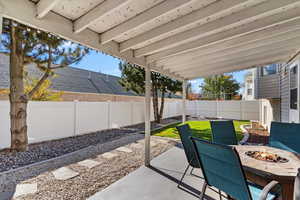 View of patio / terrace with a fire pit