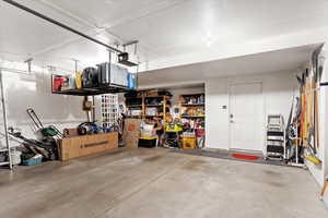 Garage featuring a garage door opener