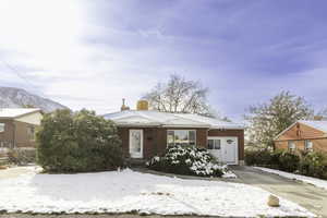 View of front of house featuring a mountain view