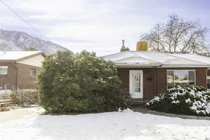 View of front of house with a mountain view