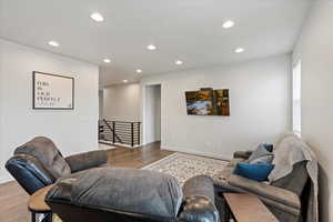 Living room featuring hardwood / wood-style flooring