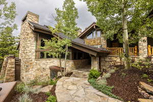 Rear view of house with a balcony