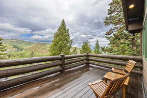 Wooden terrace with a mountain view