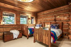 Bedroom featuring wooden ceiling