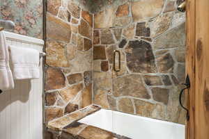 Bathroom featuring walk in shower