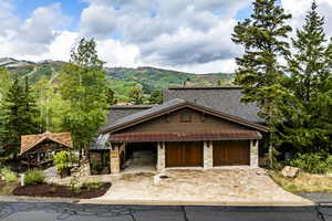 View of front of home featuring a mountain view