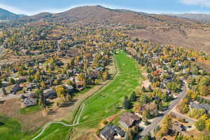 Birds eye view of property featuring a mountain view