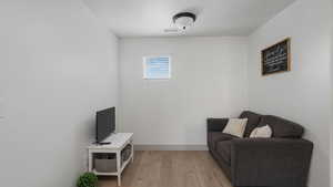 Living area featuring light hardwood / wood-style flooring