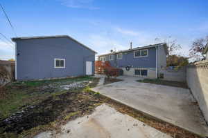 Rear view of house with a patio area