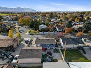 Birds eye view of property with a mountain view