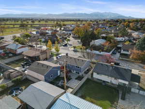 Birds eye view of property with a mountain view