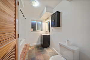 Bathroom with vanity and toilet