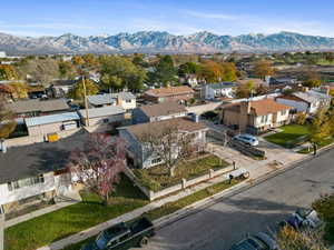 Birds eye view of property with a mountain view