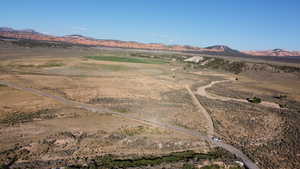 View of mountain background featuring rural landscape