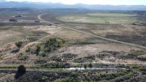 Aerial view of sparsely populated area with mountains