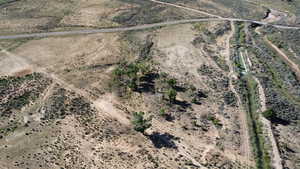 Aerial overview of property's location featuring rural landscape and a desert landscape