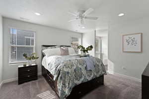 Primary Suite with ceiling fan