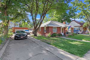 View of front facade with a front yard