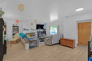 Living room featuring light hardwood / wood-style floors