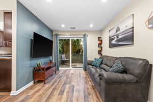 Living room featuring wood-type flooring