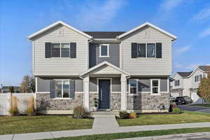 View of front facade with a front lawn