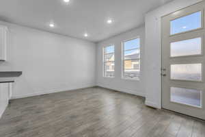 Entrance foyer featuring wood-type flooring