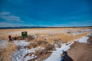 View of yard with a rural view