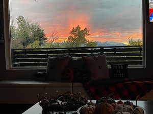 Balcony at dusk with a mountain view