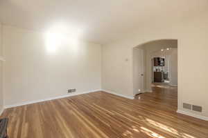 View towards the dining room and kitchen from the living room