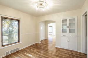 View from dining room into foyer and living room