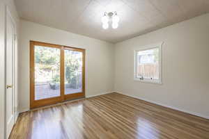 Bedroom 4 (or den/office). This airy room features hardwood floors and a large closet, andlooks onto the inner courtyard patio