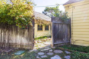 Entrance from backyard to inner courtyard patio