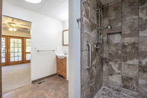 Master bathroom, with bedroom in the background