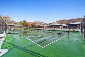 View of sport court with a mountain view