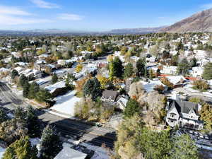 Birds eye view of property with a mountain view