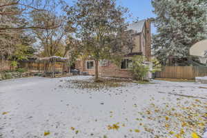 View of yard covered in snow